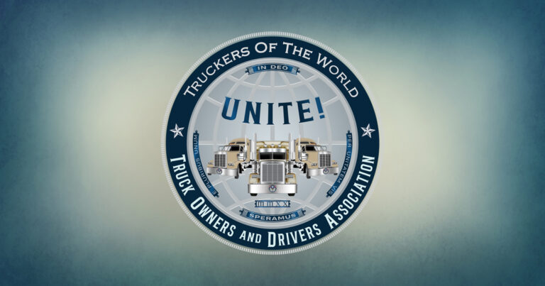 Slogan of Truck Owners and Drivers Association Global Network, "Truckers of the World, Unite!" with three semi-trucks in front of a globe, the words "Truckers of the World, Unite!" and the mottos In Deo Speramus, E Pluribus Unum and Per Unitatem Vis